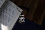 brass-teddy-bear-reading-bookmark